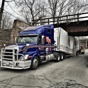 DOT semi truck accident under a bridge